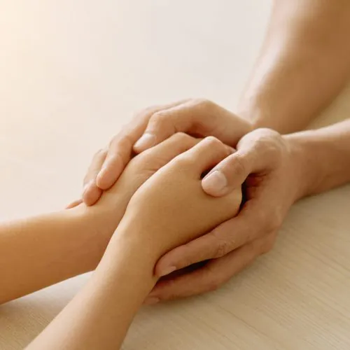 hands-anonymous-supportive-friend-holding-hands-woman-scaled.jpg